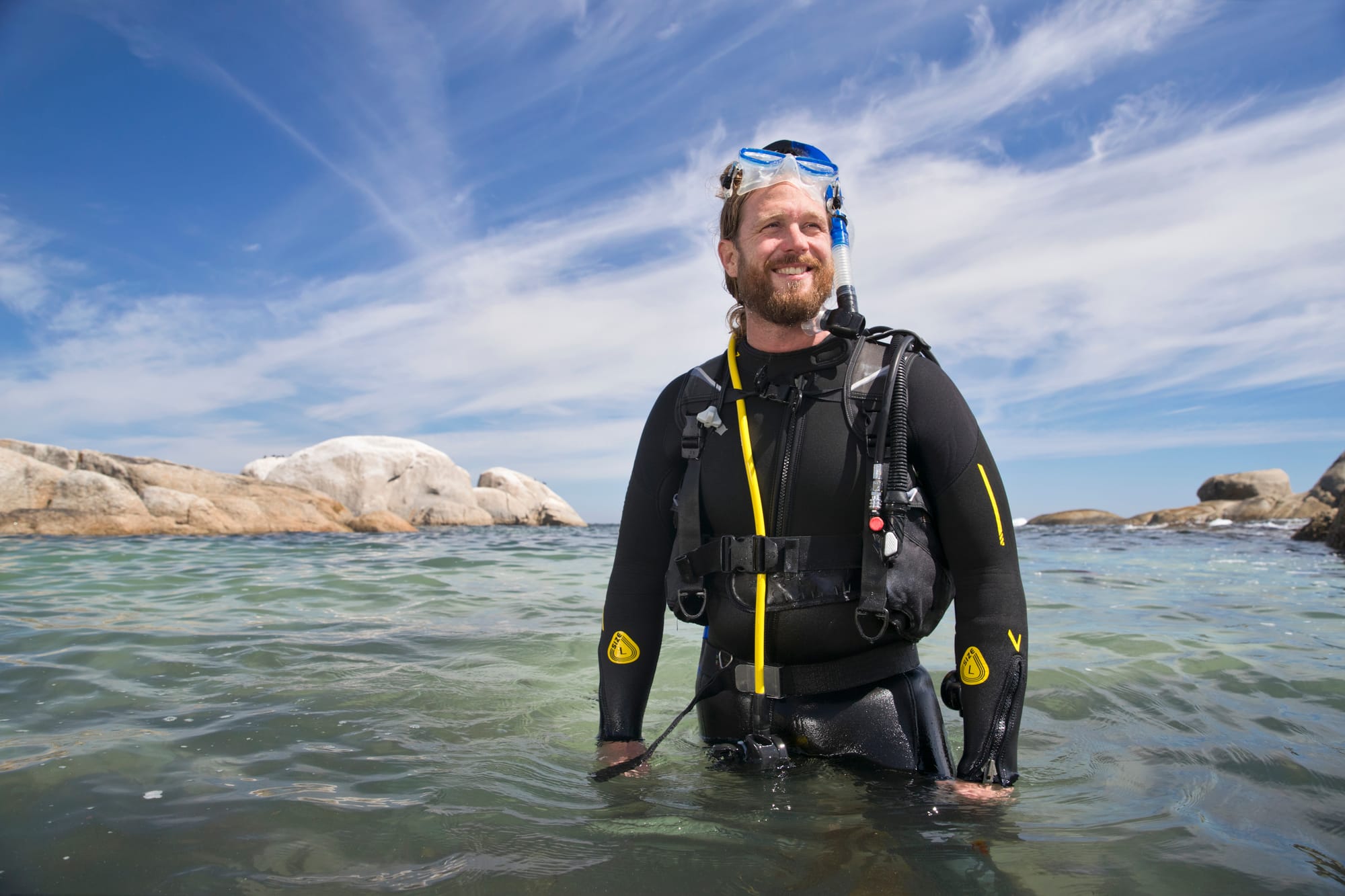 Diver on the surface wearing a wetsuit