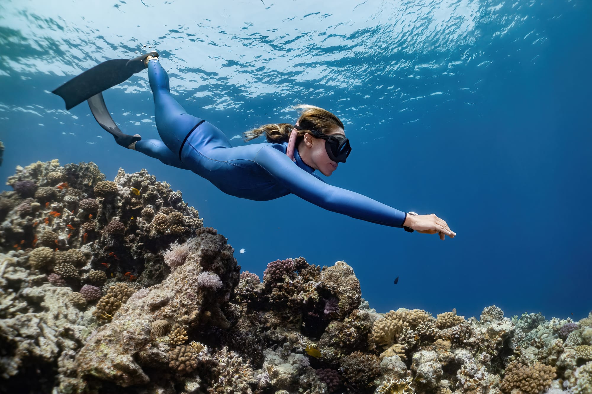 Freediver wearing a freediving low-volume mask