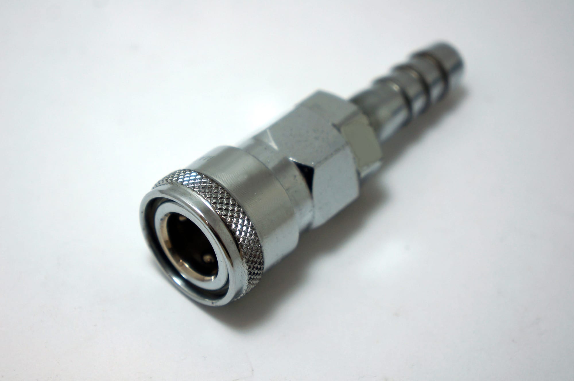 A quick-fitting type, found on inflator hoses for scuba divers