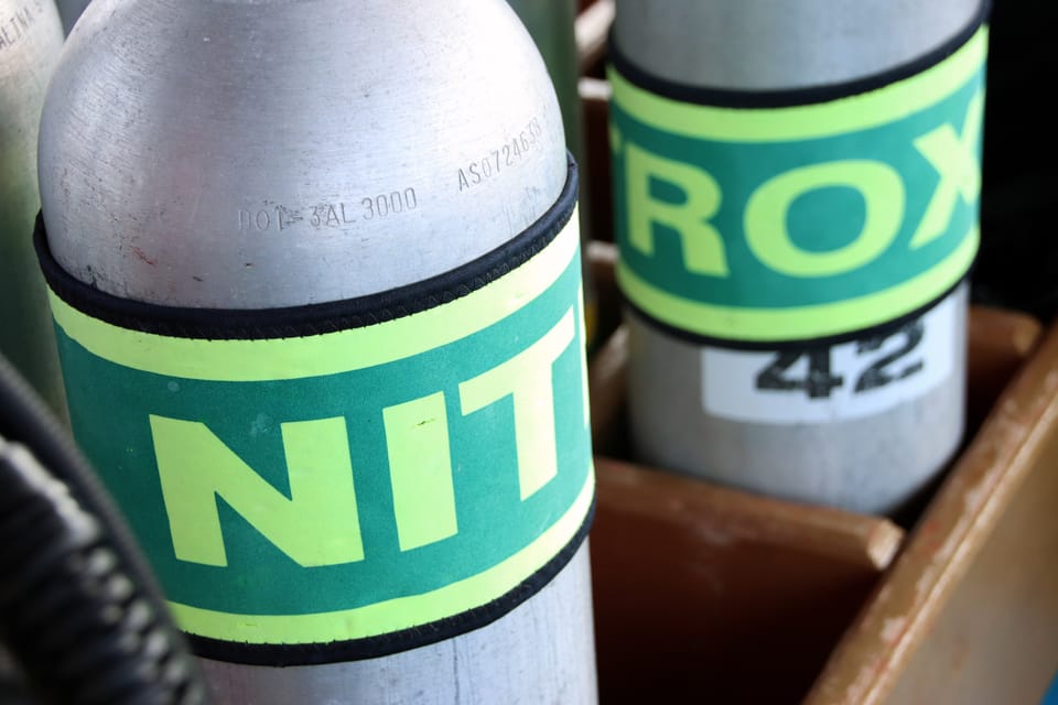 Scuba diving Nitrox tanks marked with a green band