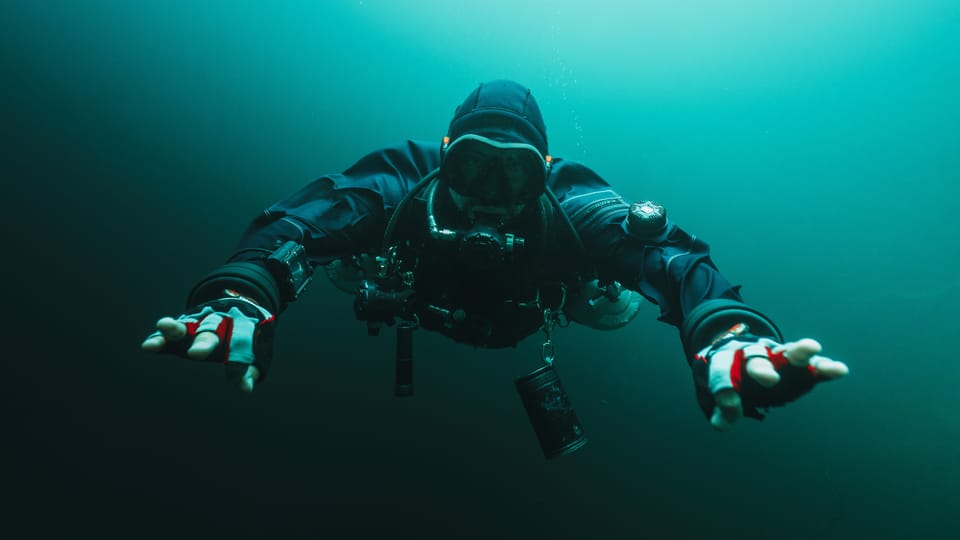 A technical diver in a sidemount configuration
