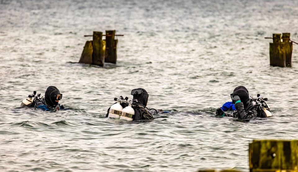 technical divers training in a lake or in the ocean
